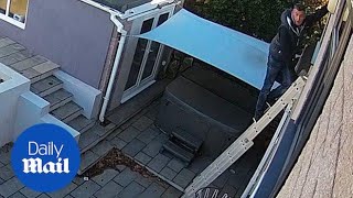 Caught on camera Burglar breaks into house using ladder  Daily Mail [upl. by Kal583]